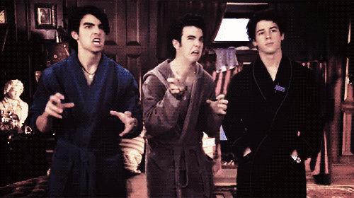 jonas brothers growl in bathrobes