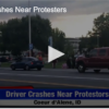 Driver Crashes Near Protesters