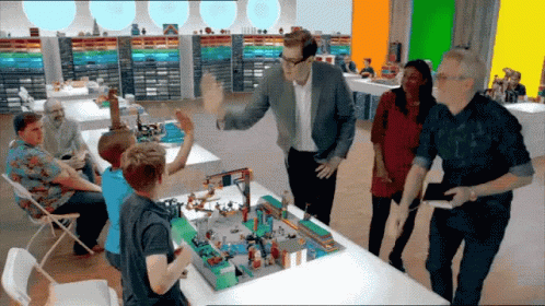 high fives from contestants to hosts on lego masters