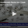 Plow Truck Accidentally Backs into Creek