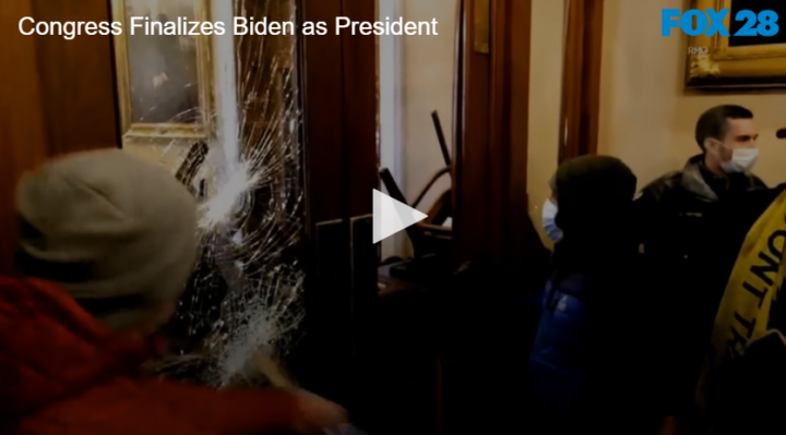 mob breaking a glass door window