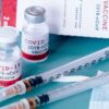 Vaccine Bottles and Needles
