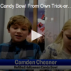 Boy Refills Candy Bowl From Own Trick-or-Treat Bag