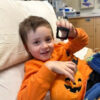 Kids at Sacred Heart surprised with Halloween goodie bags from Childhood Cancer Coalition