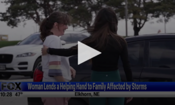 Woman Lends A Helping Hand To Family Affected By Storms
