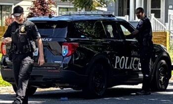 Spokane police arrest two after drive-by shooting, suspect had multiple warrants