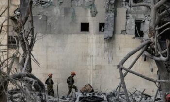 7 Israeli troops are killed in a Gaza bombing as Palestinian officials say Israeli attacks kill 79