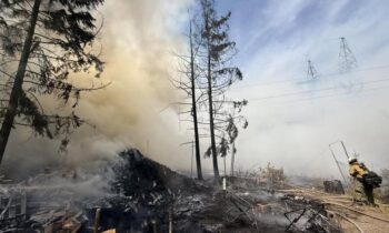 Section of North Five Mile Road closed due to mop-up operations after fire