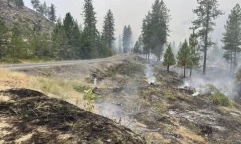 Lake Spokane Fire now over 50% contained, evacuations hold