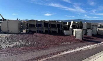 Cherries cover the road after semi truck turnover in Washington