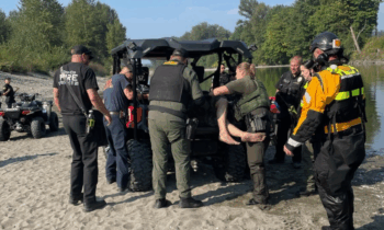 Escaped custody suspect arrested while fishing in Arlington