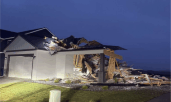 Man in custody for destroying a house with an excavator, Post Falls police say