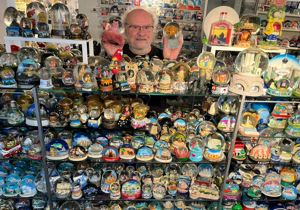 Man sets world record for largest snow globe collection