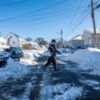 Northeast US faces power cuts and school closures after snowstorm